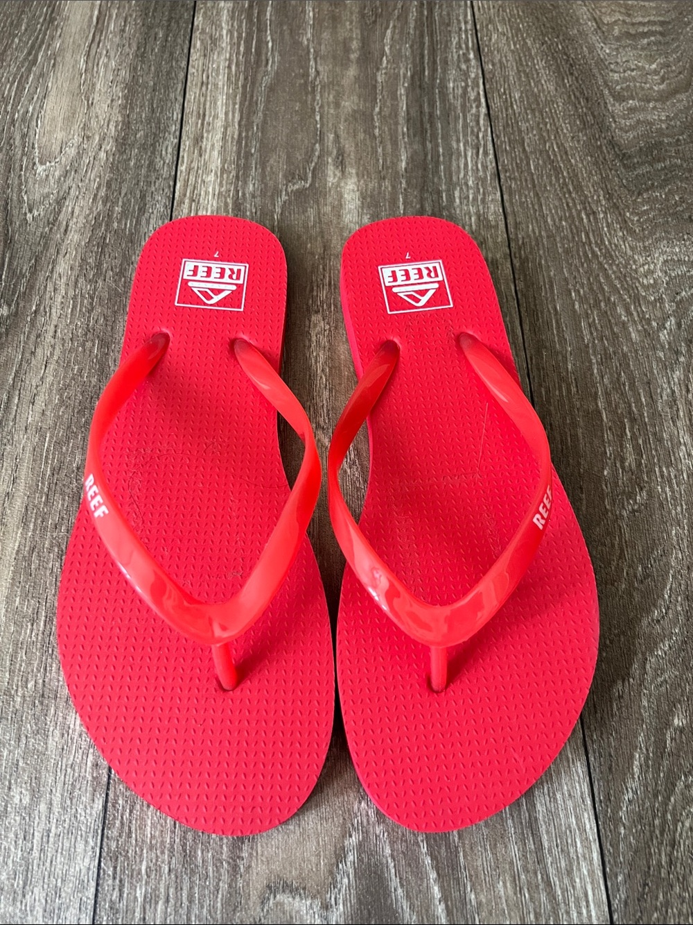 Reef Red Flip Flops